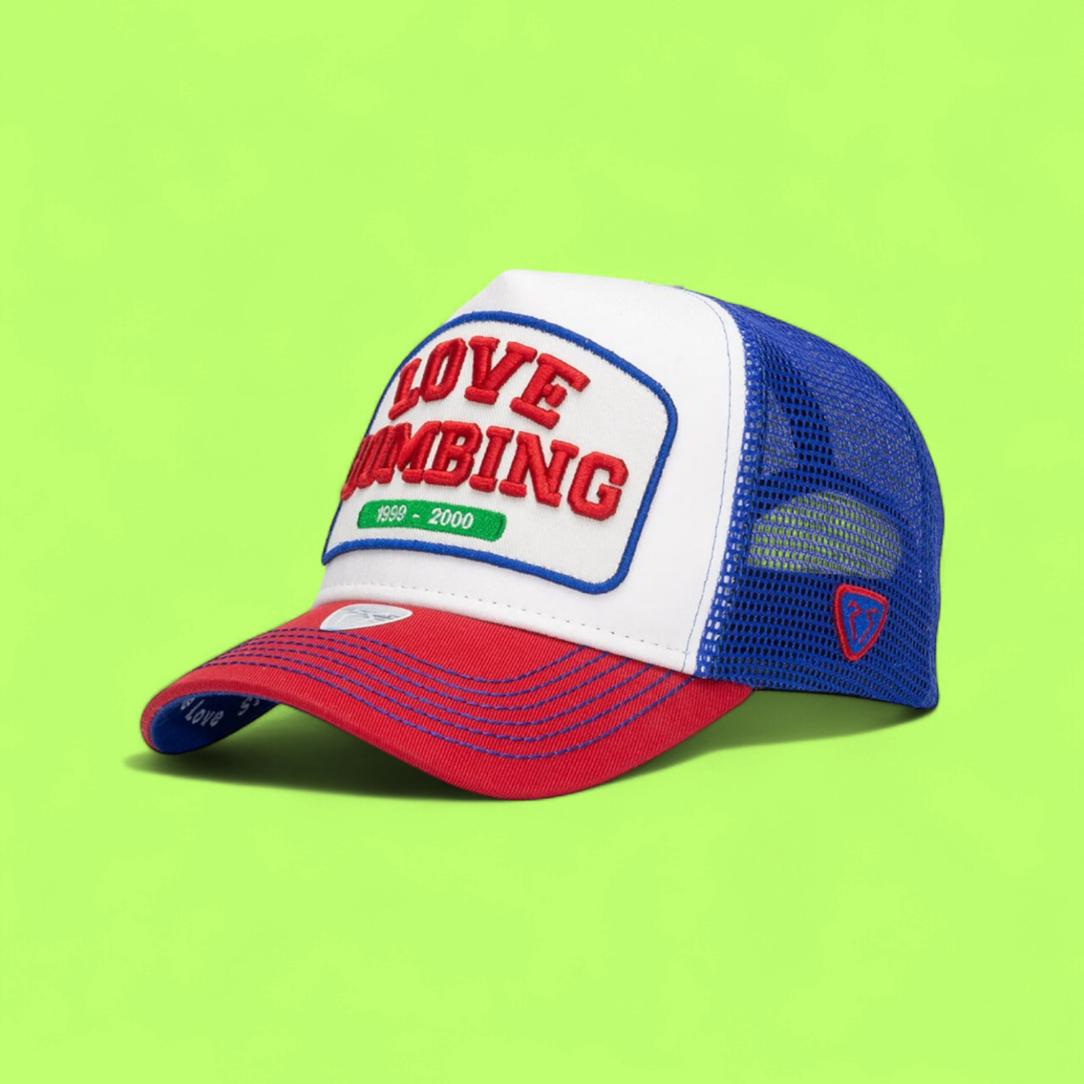LOVE BOMBING TRUCKER CAP WITH BLUE MESH AND RED BRIM