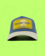 JOHN HATTER BLUE AND BEIGE CAP WITH PAIN DON’T HURT PLATE