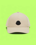 MONCLER BEIGE CAP WITH BLACK LOGO PATCH ICON DROPZ CWCD