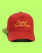 RED BASEBALL CAP WITH YELLOW EMBROIDERED FRONT SIGNATURE