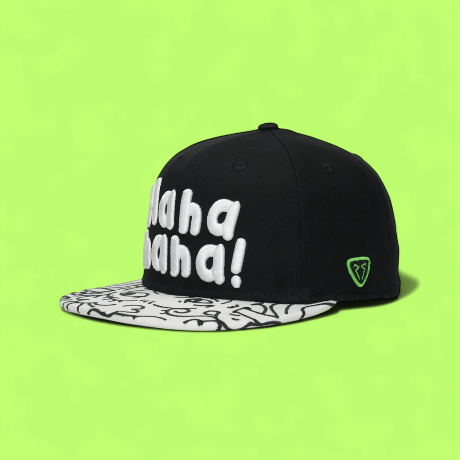 BLACK SNAPBACK CAP WITH WHITE LETTERS AND PATTERNED VISOR
