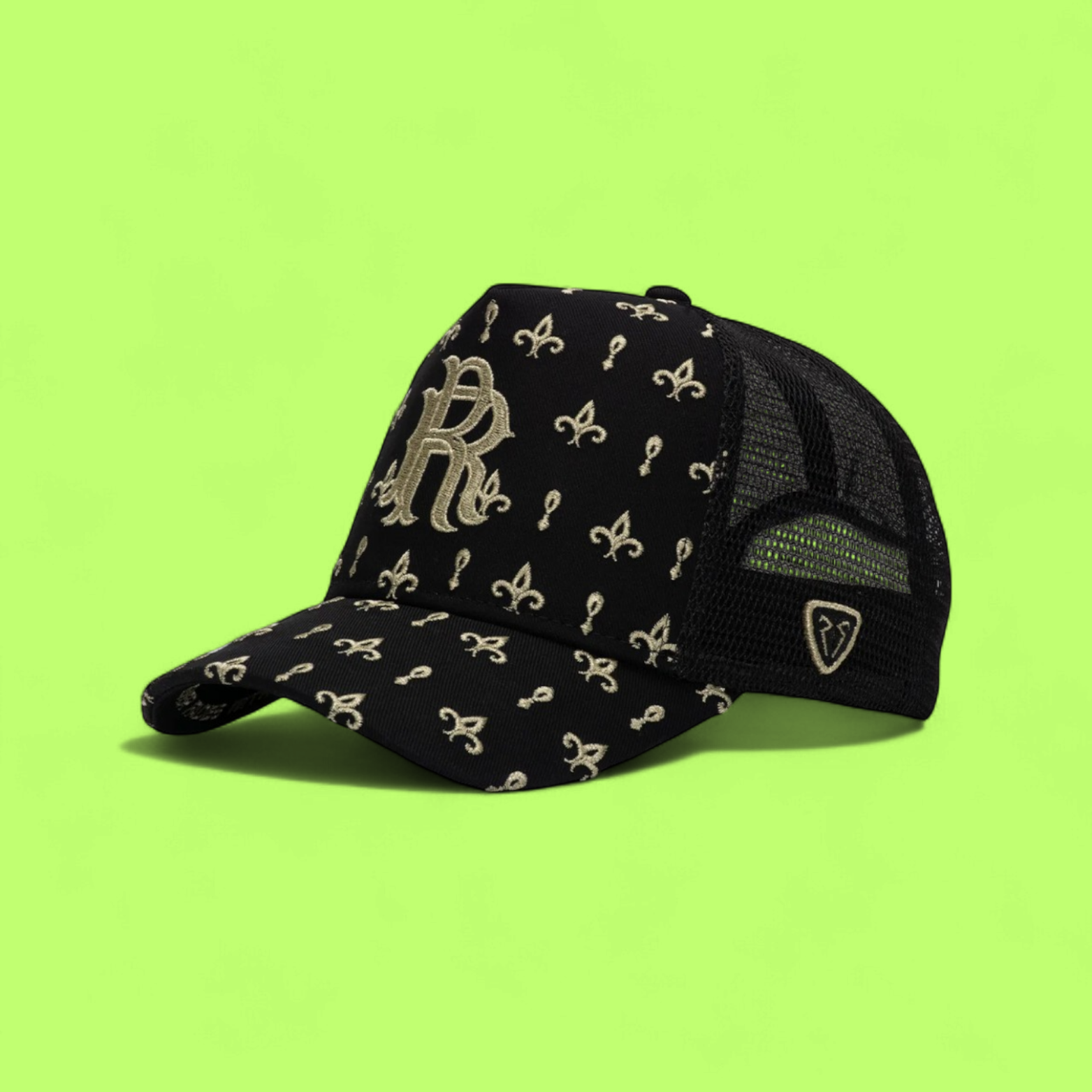 BLACK TRUCKER CAP WITH GOLDEN R LOGO AND FLORAL PATTERN