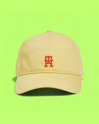 TOMMY HILFIGER YELLOW BASEBALL CAP WITH RED EMBROIDERED TH