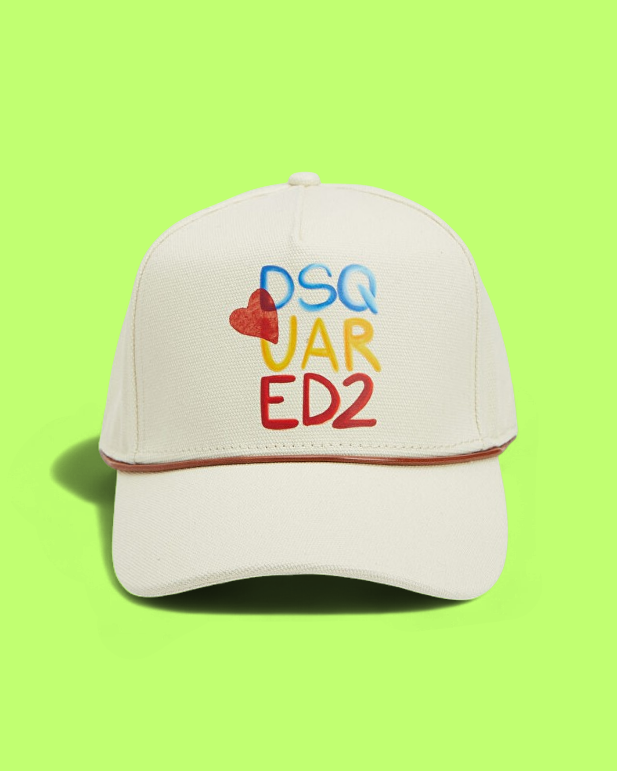 CREAM CAP WITH COLORFUL PRINTED DESIGN AND HEART DETAIL