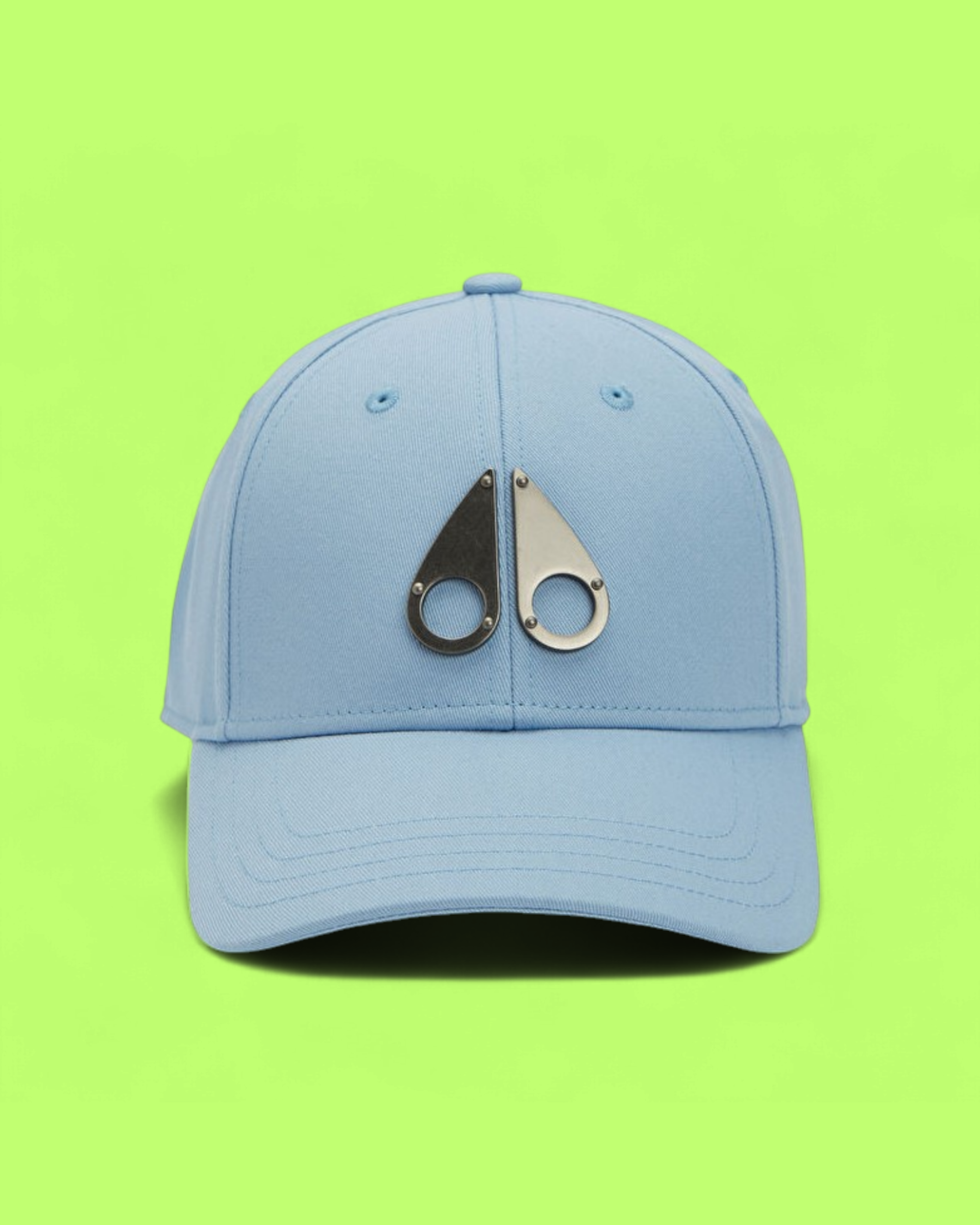 LIGHT BLUE BASEBALL CAP WITH SILVER METAL EMBLEM AND MODERN