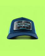 JOHN HATTER BLUE MESH CAP WITH FAR FROM OKEY LOGO PLATE