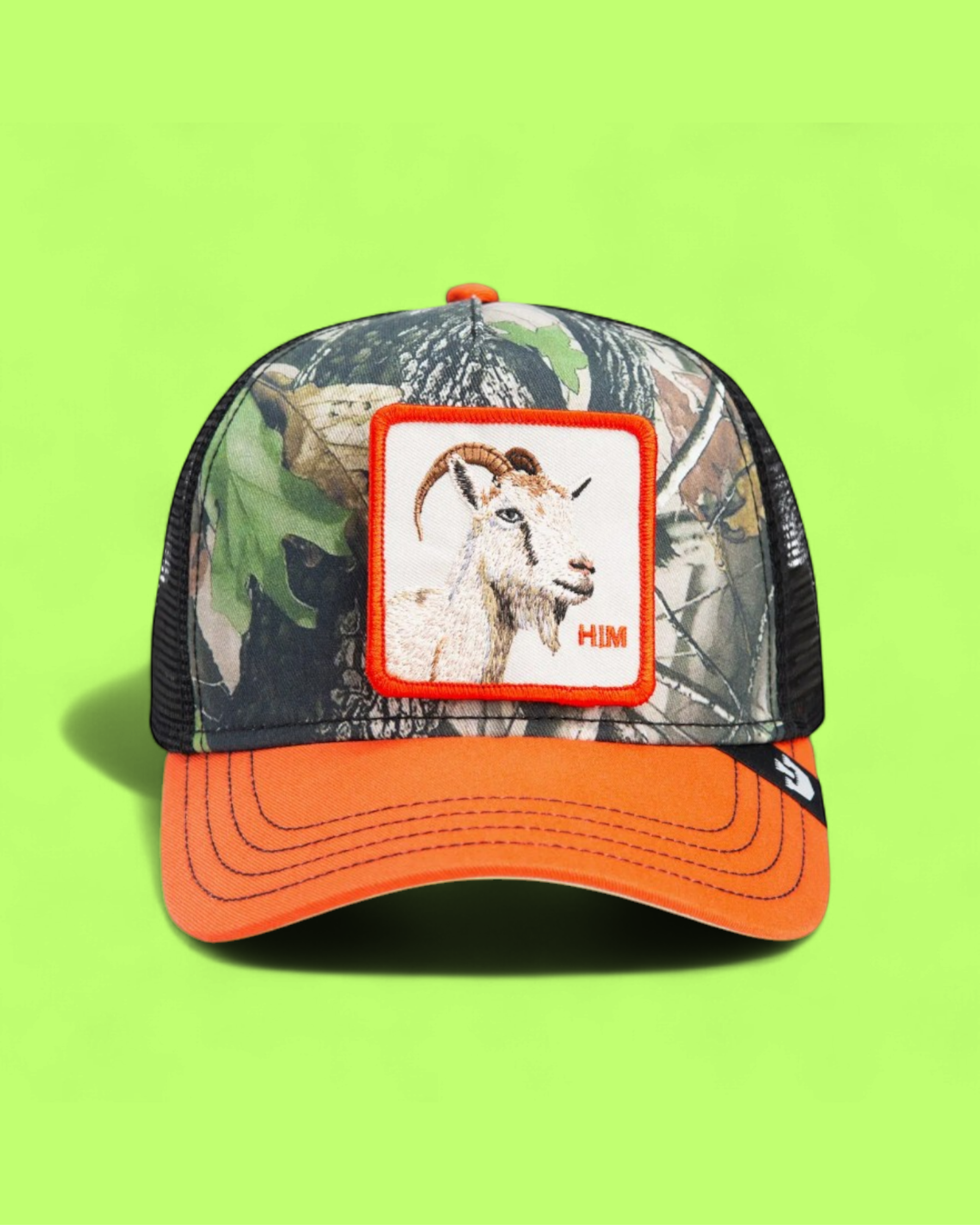 HIM GOAT CAMO TRUCKER HAT WITH ORANGE BRIM AND PATCH DESIGN