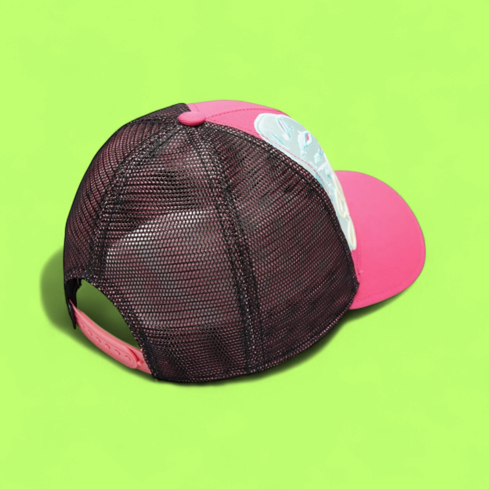 PINK TRUCKER CAP WITH BLUE LEAF DETAILS AND YELLOW TEXT CWCDE