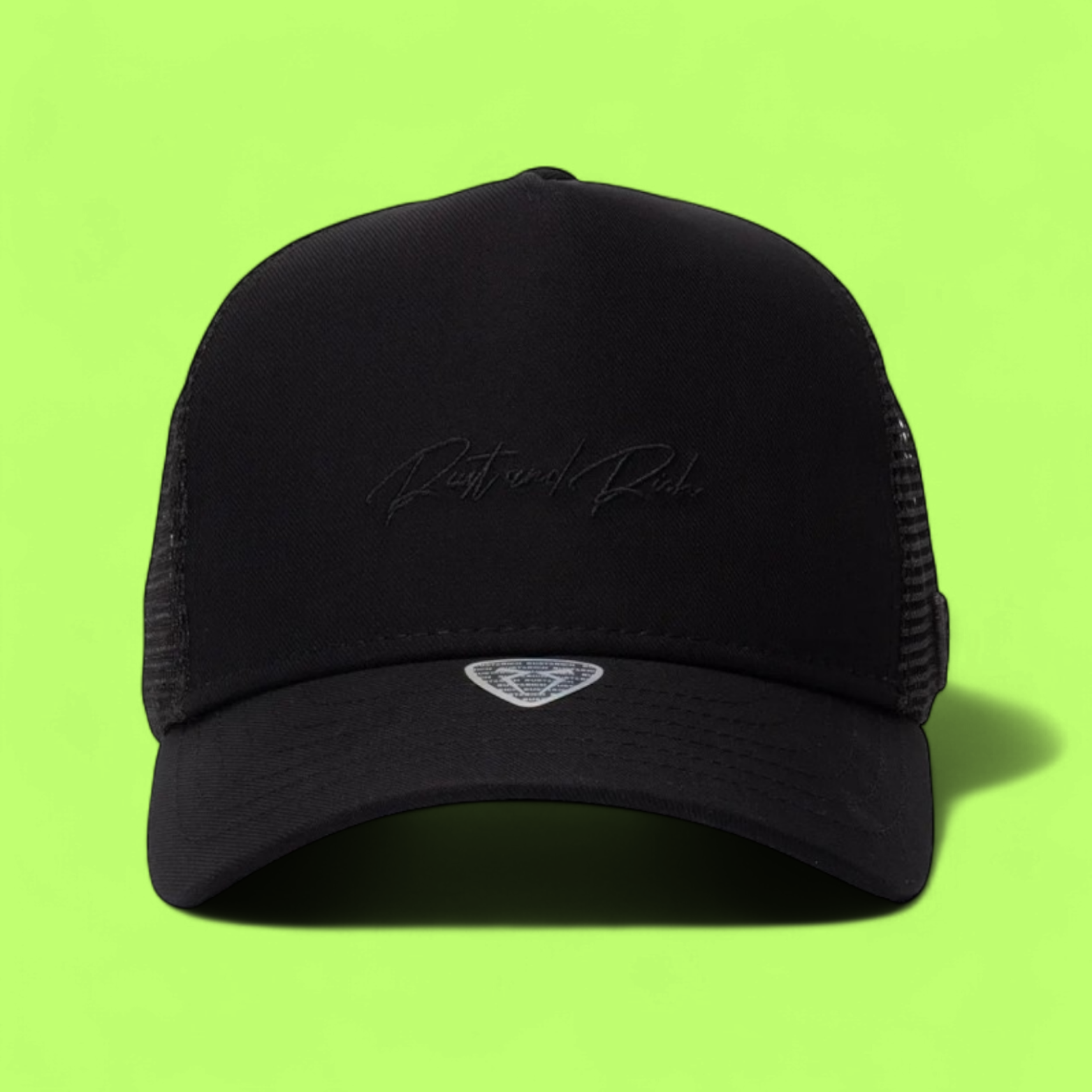 BLACK TRUCKER CAP WITH MINIMAL TONE ON TONE EMBROIDERY