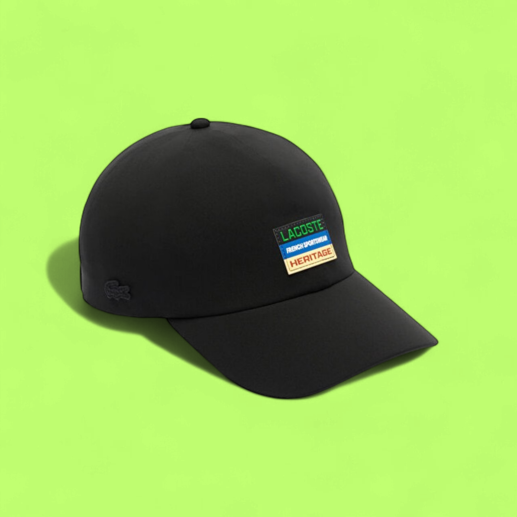LACOSTE BLACK CAP WITH HERITAGE MULTICOLOR LOGO PATCH CWCD