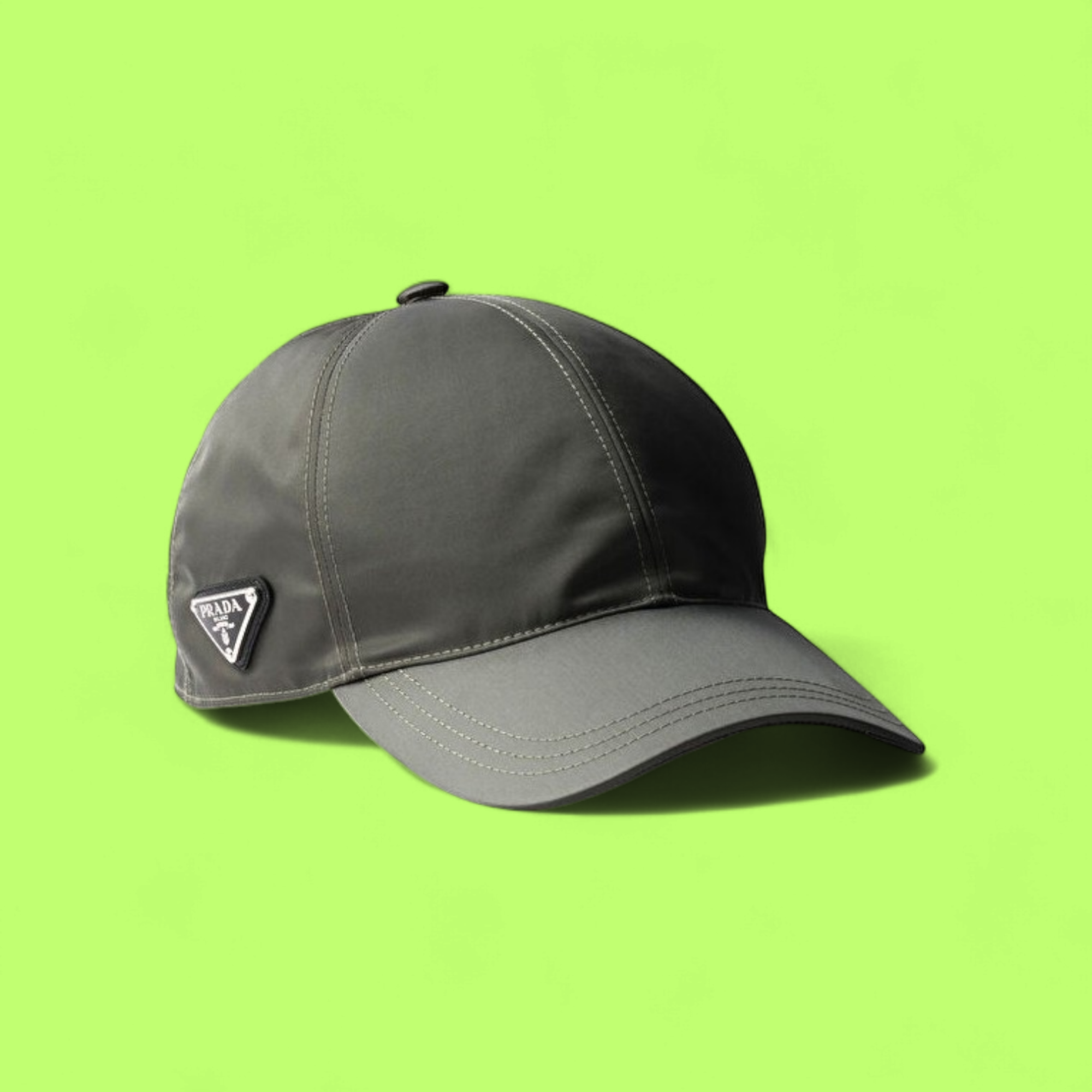 PRADA GREY NYLON BASEBALL CAP WITH ICONIC TRIANGLE LOGO