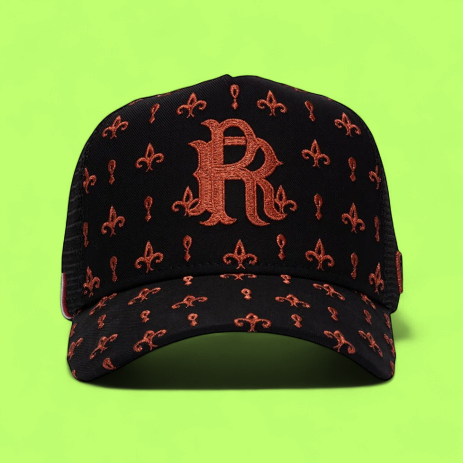 BLACK TRUCKER CAP WITH ORANGE R LOGO AND FLORAL PATTERN
