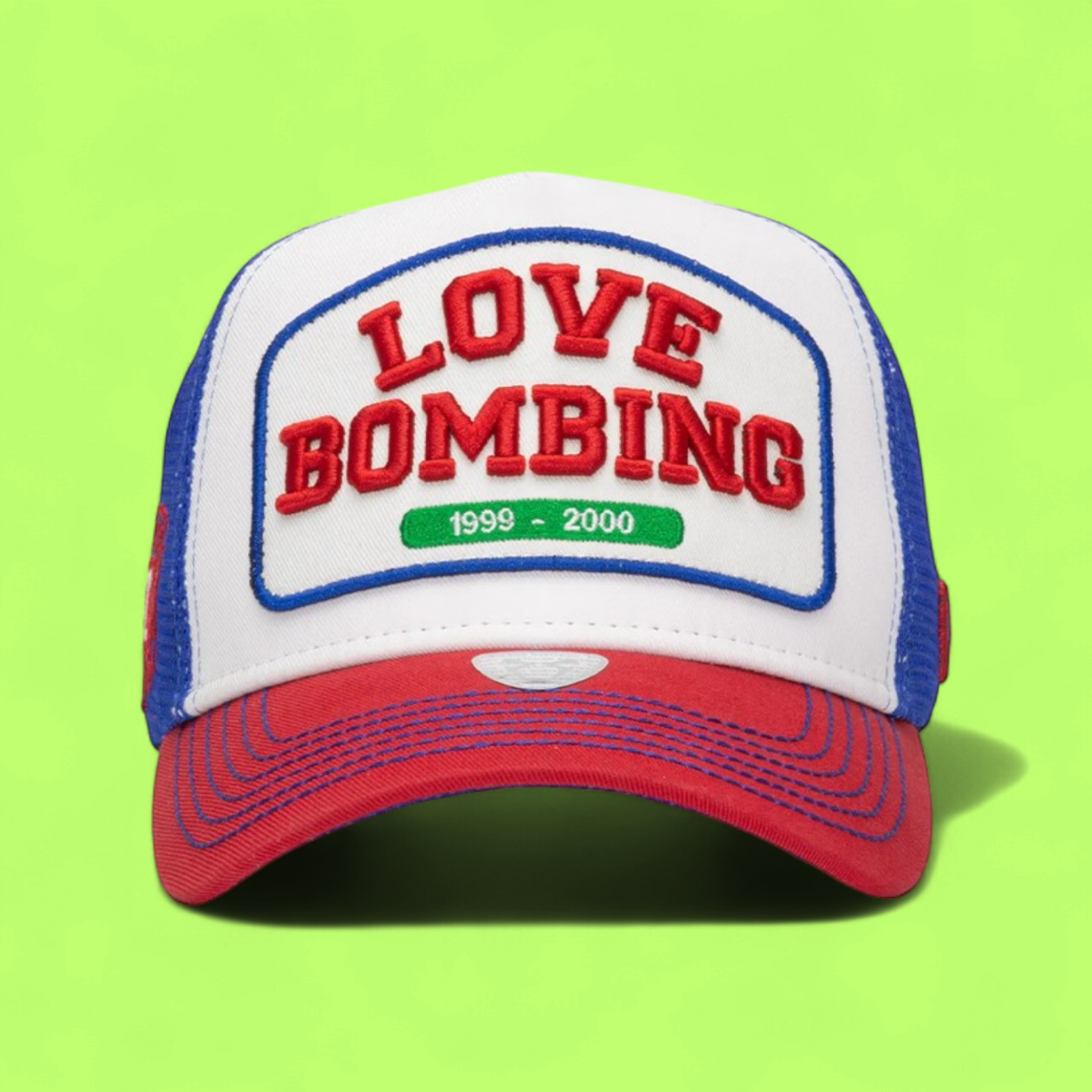 LOVE BOMBING TRUCKER CAP WITH BLUE MESH AND RED BRIM