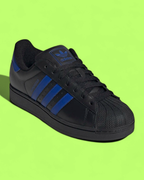 ADIDAS SUPERSTAR BLACK LEATHER SNEAKERS WITH BLUE STRIPES