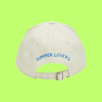 CREAM CAP WITH COLORFUL PRINTED DESIGN AND HEART DETAIL