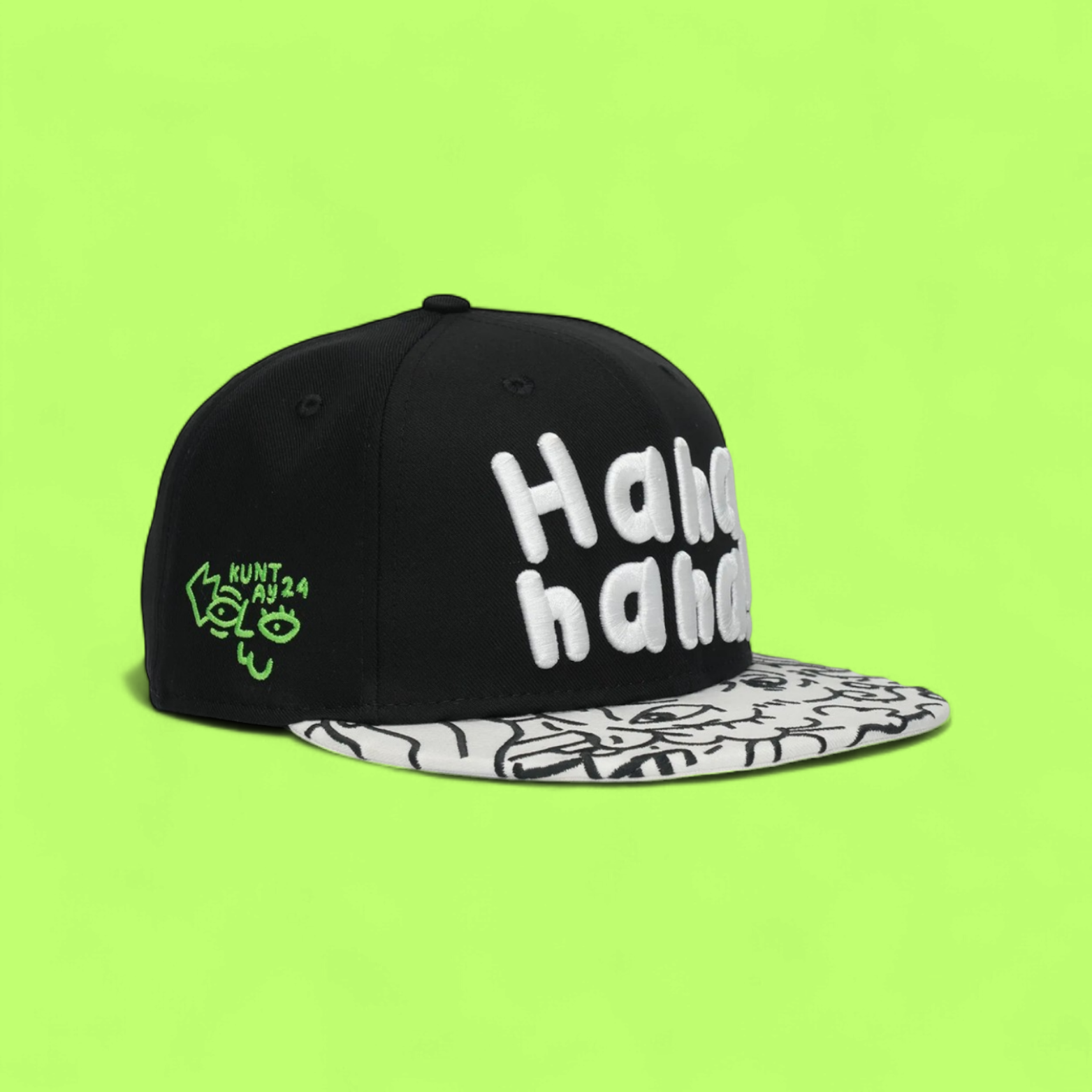 BLACK SNAPBACK CAP WITH WHITE LETTERS AND PATTERNED VISOR
