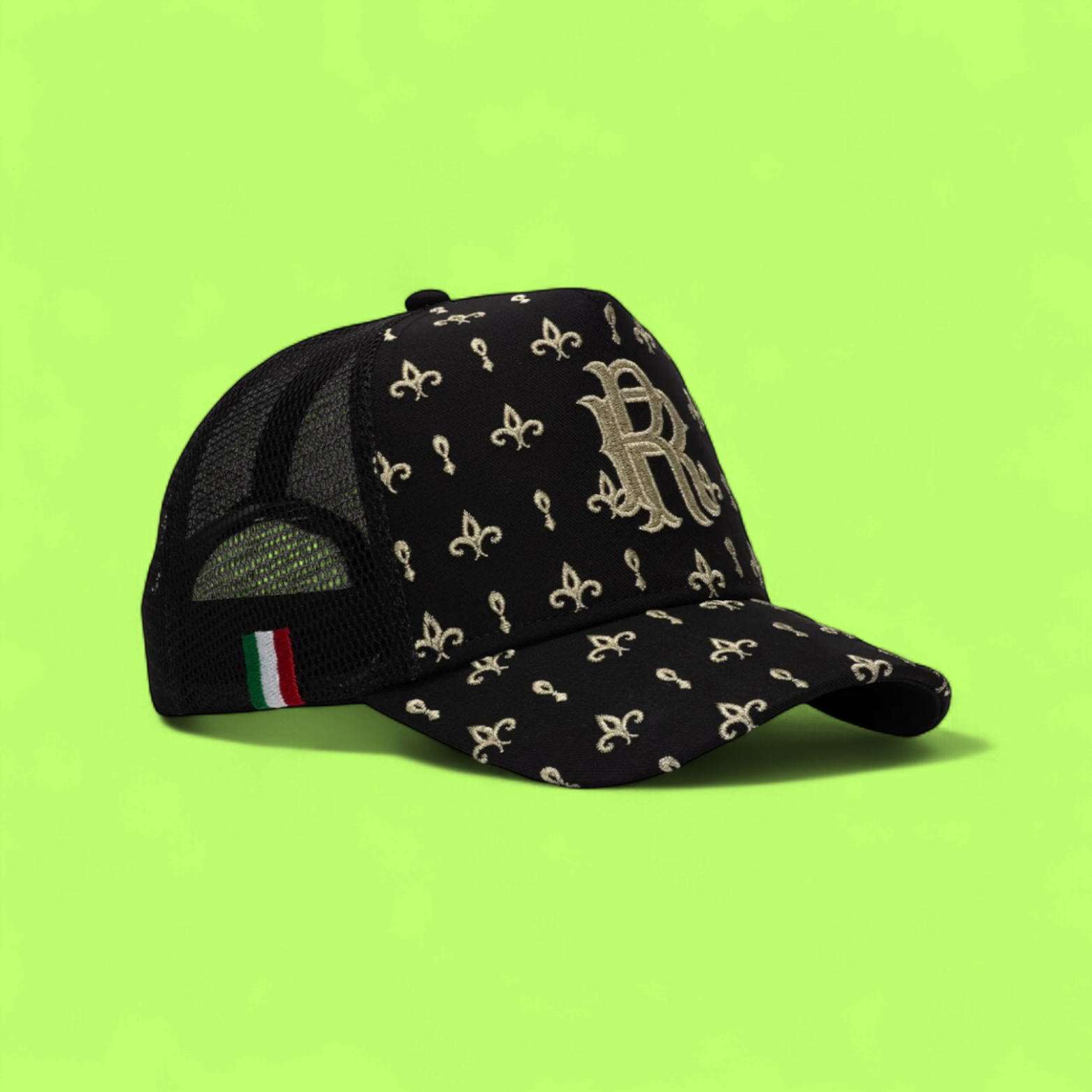 BLACK TRUCKER CAP WITH GOLDEN R LOGO AND FLORAL PATTERN