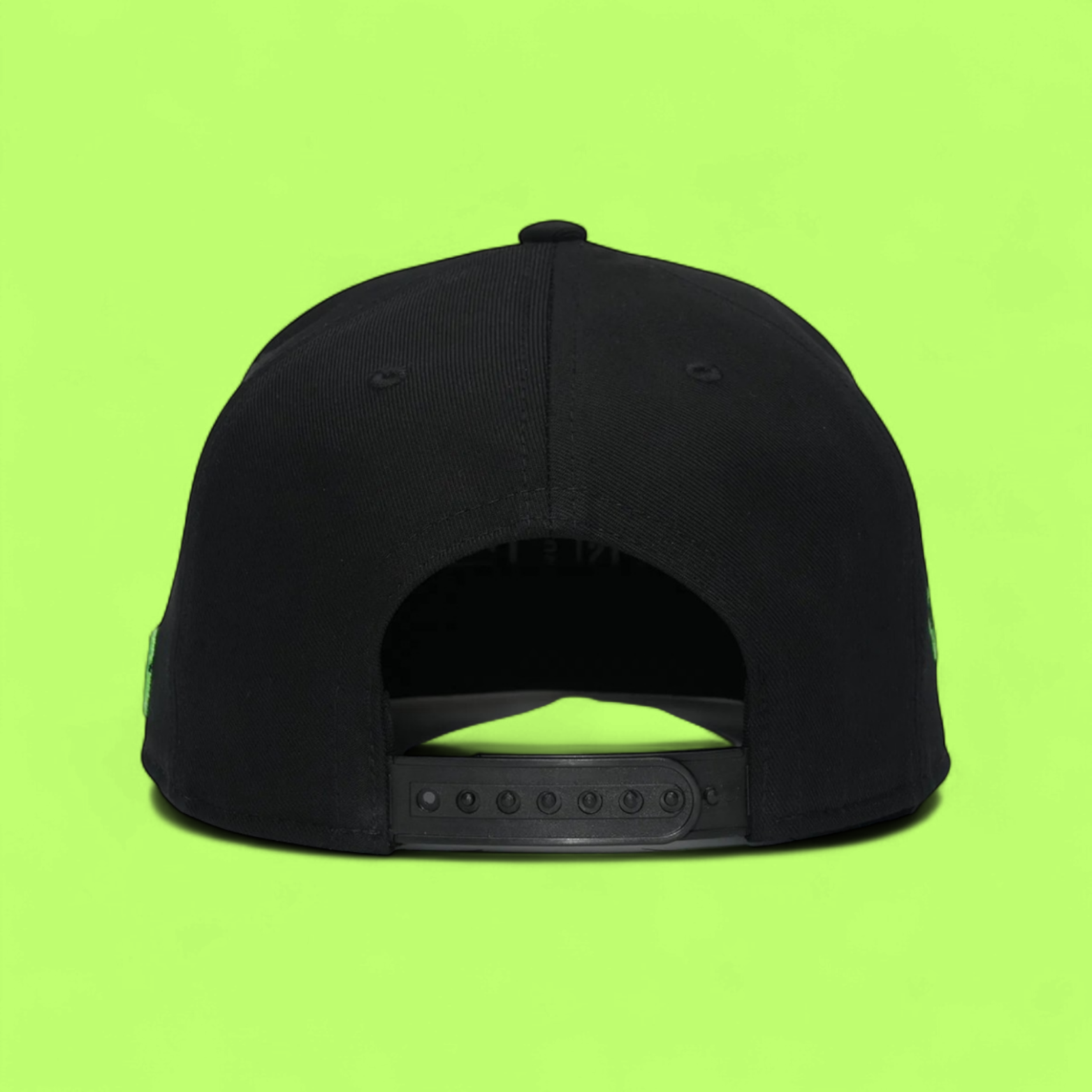 BLACK SNAPBACK CAP WITH CARTOON FACE GRAPHIC FRONT PANEL