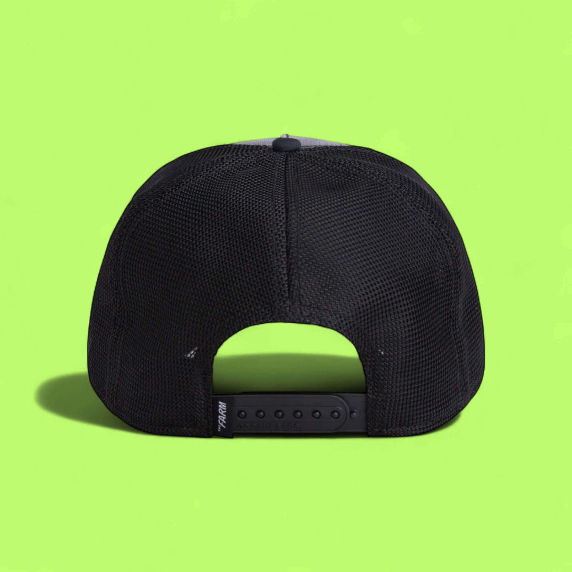 UNSTOPPABLE RHINO BLACK TRUCKER HAT WITH EMBROIDERED PATCH